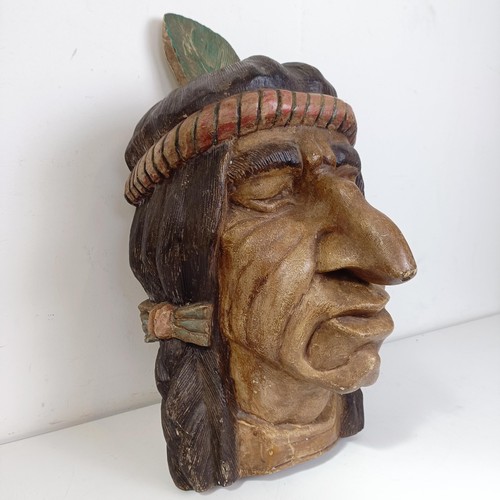 1252 - A wooden carving of a native Indian head, reportedly made as a promotional item for Players cigarett... 