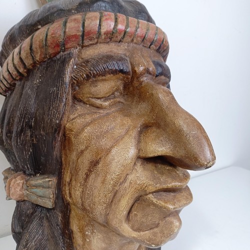 1252 - A wooden carving of a native Indian head, reportedly made as a promotional item for Players cigarett... 