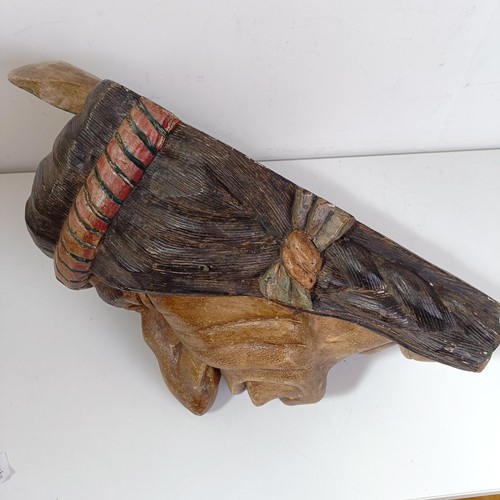 1252 - A wooden carving of a native Indian head, reportedly made as a promotional item for Players cigarett... 