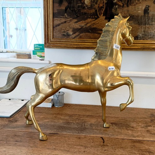 1330 - A large brass figure of a horse, 70 cm wide