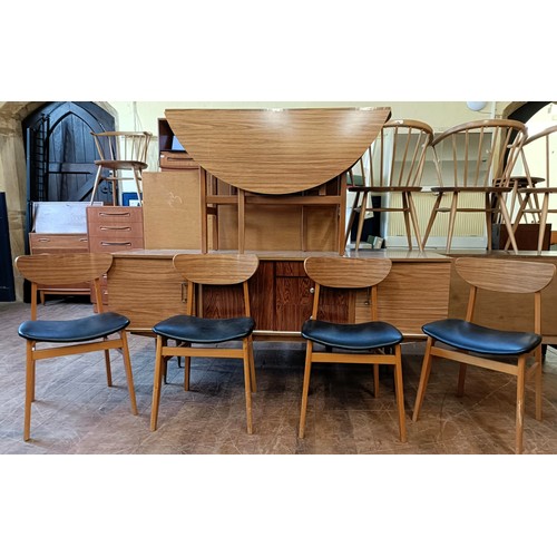 464 - A 1950s dining room suite, comprising a sideboard, four chairs and a drop leaf table (6)