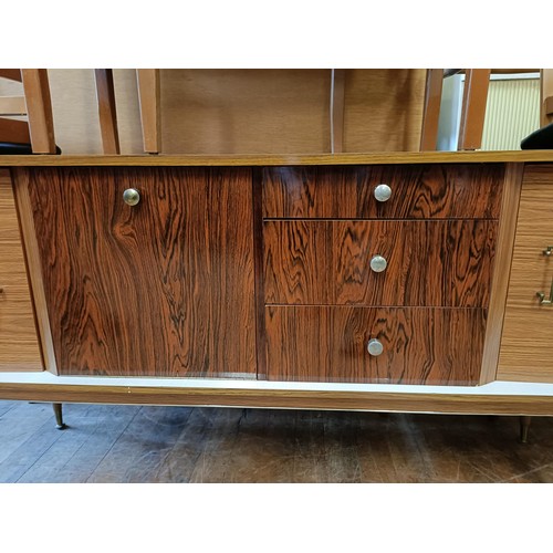 464 - A 1950s dining room suite, comprising a sideboard, four chairs and a drop leaf table (6)