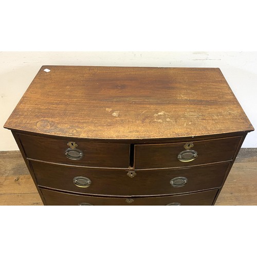 1371 - A mahogany bow front chest, having two short and two long drawers, 89 cm wide, a bureau and two tabl... 