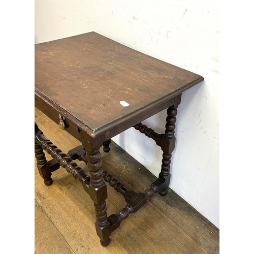 1367 - An oak side table, with a single drawer, on bobbin turned legs, 68 cm wide