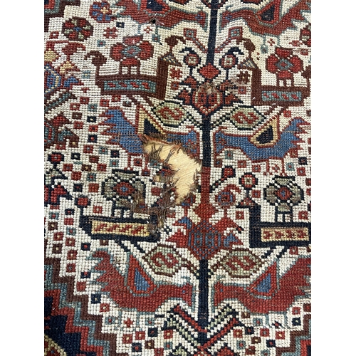 1504 - A Persian carpet, 284 x 161 cm, and another (2)