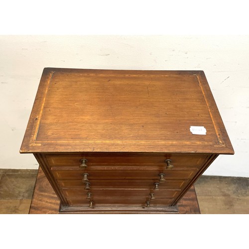 1361 - A mahogany apprentice type chest, having five long drawers, 40 cm wide