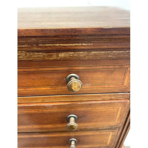 1361 - A mahogany apprentice type chest, having five long drawers, 40 cm wide