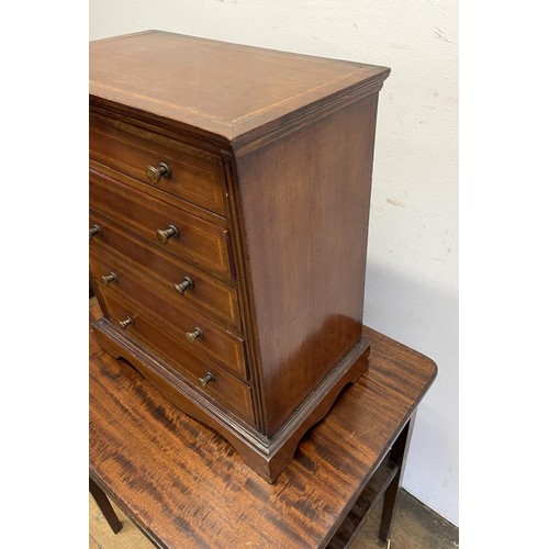 1361 - A mahogany apprentice type chest, having five long drawers, 40 cm wide