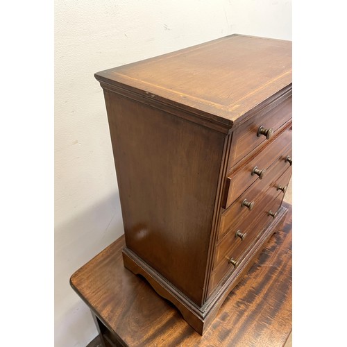 1361 - A mahogany apprentice type chest, having five long drawers, 40 cm wide