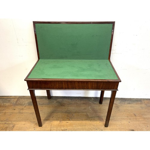 1368 - A mahogany folding card table, 87 cm wide, and an Eastern sewing box (2)