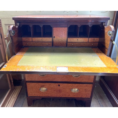 1416 - A 19th century mahogany and birdseye maple secretaire chest, of small proportions, having a fitted d... 