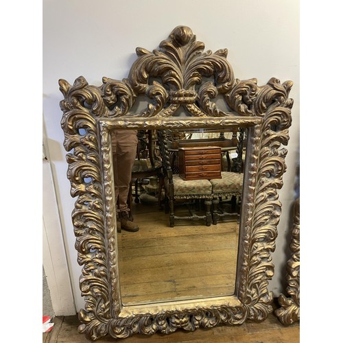 1424 - A pair of modern rococo style mirrors, 147 x 93 cm (2)