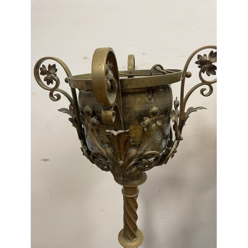 1422 - A pair of brass Gothic Revival jardinieres, on spiral column supports, to a shaped base with lion pa... 