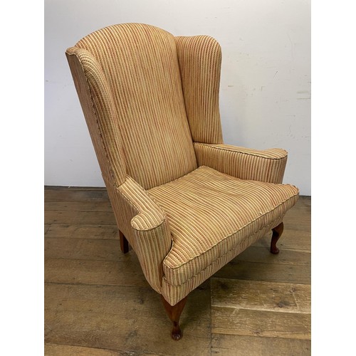 1383 - A George III style wingback armchair