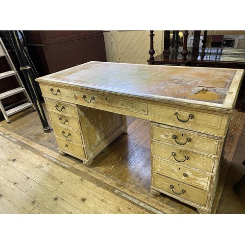 1388 - A partners painted  desk, the top having three drawers above pedestals with three drawers, opposite ... 