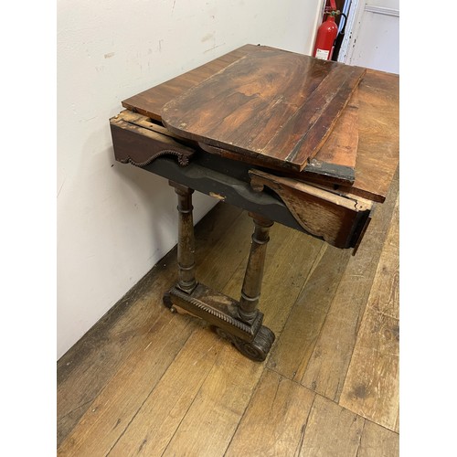 1475 - A 19th century rosewood sofa table, in need of restoration, 90 cm wide