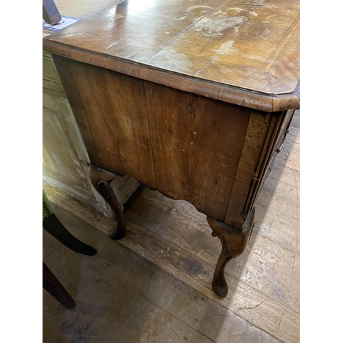 1407 - A walnut dresser base, having five drawers, on carved cabriole legs, 136 cm wide