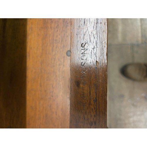 1477 - A mahogany pedestal desk, having a nine drawers, stamped Howard & Son, 125 cm