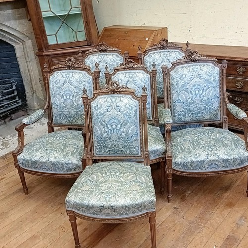 1462 - A 19th century style French parlour suite, comprising four walnut framed armchairs and two single ch... 