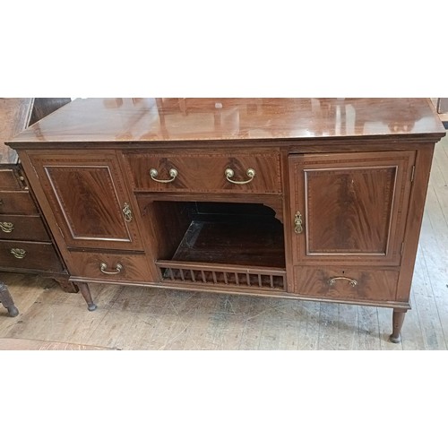 1465 - A carved oak triangular table, an oak tub chair and a sideboard (3)