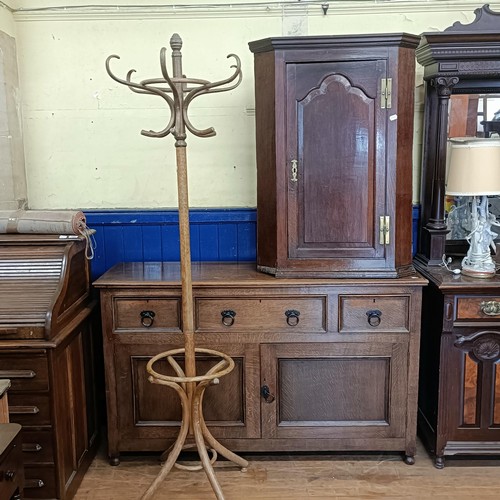 1445 - An oak bureau, 84 cm wide, a stool, a corner cupboard, a hat stand, and a sideboard (5)