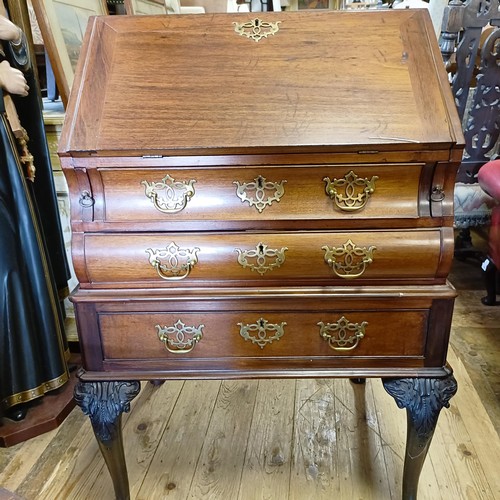 1381 - An 18th century style mahogany bureau, 66 cm wide, and a pair of mahogany two tier tables (3)