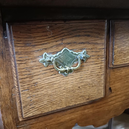 1362 - An oak lowboy, having three drawers, 75 cm wide