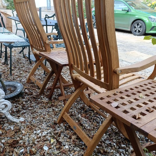 1494 - A set of three teak folding garden chairs, and three folding garden tables