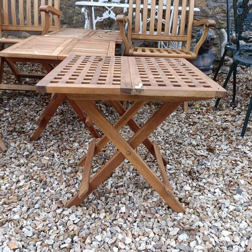 1494 - A set of three teak folding garden chairs, and three folding garden tables