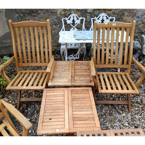 1494 - A set of three teak folding garden chairs, and three folding garden tables