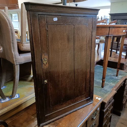 1408 - A walnut demi-lune side table, 110 cm wide, an oak corner cabinet, an oak arm chair, a mahogany desk... 