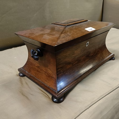 1341 - A 19th century rosewood tea caddy, a hinged lid to reveal a cut glass mixing bowl, repaired, and two... 