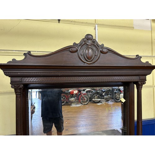 1540 - A walnut sideboard, with a mirrored back, 157 cm wide