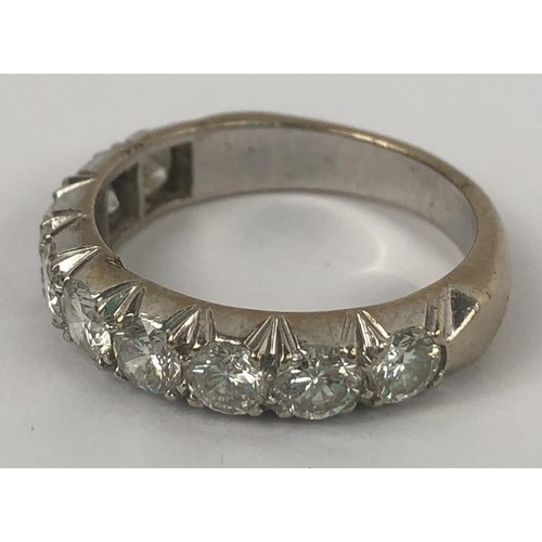 602 - An 18ct white gold and diamond half eternity ring, ring size M