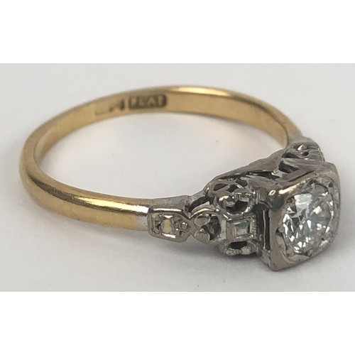 643 - An 18ct gold, platinum and solitaire diamond ring, ring size P