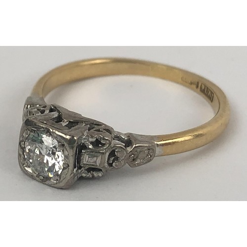 643 - An 18ct gold, platinum and solitaire diamond ring, ring size P