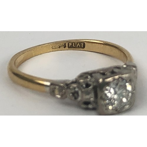 643 - An 18ct gold, platinum and solitaire diamond ring, ring size P