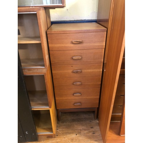 491 - A Minty sectional bookcase, another, and a teak chest of six drawers (3)