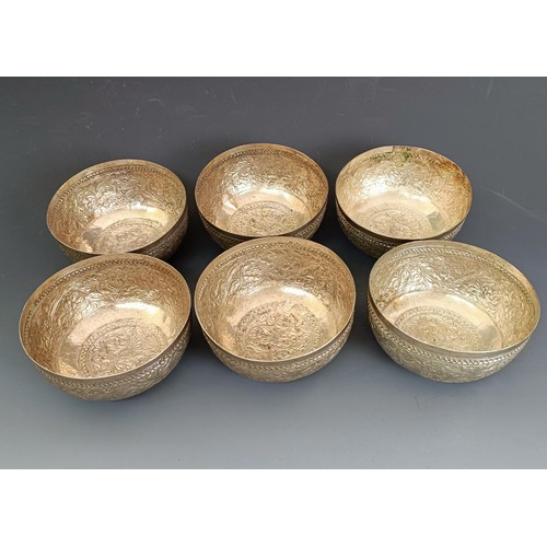 16 - A group of silver coloured metal bowls, and other items