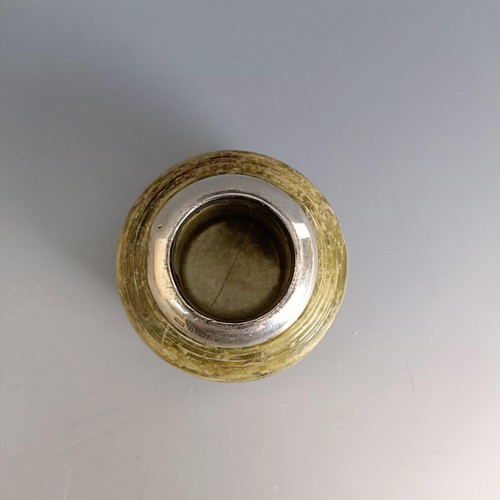 29 - An onyx and silver mounted match strike, marks rubbed