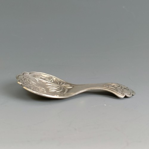 31 - A caddy spoon, with a chased bowl