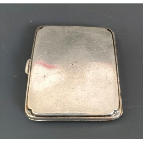 64 - A George V silver cigarette case, and a silver vesta, various dates and marks, 3.2 ozt (2)