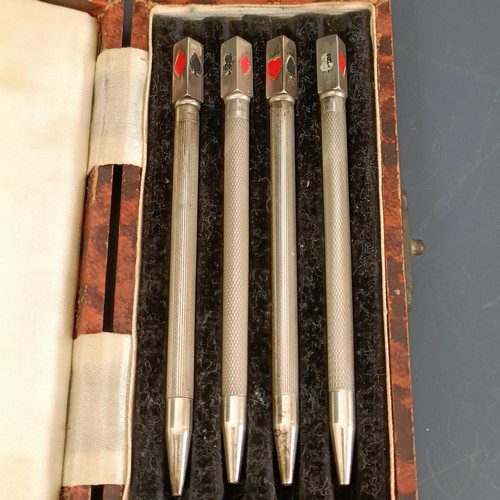 65 - A set of four bridge pencils, cased