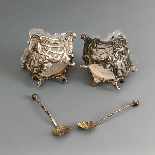 66 - A pair of sterling silver and shell salts, a pair of silver coloured metal salts, .800, and a pair o... 