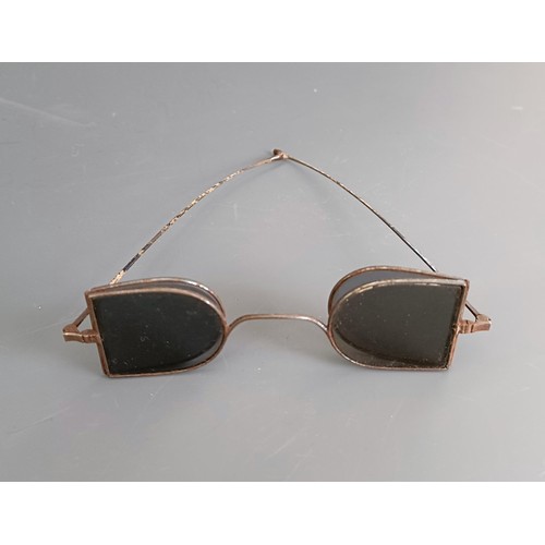 67 - A pair of silver spectacles, and two other pairs (3)