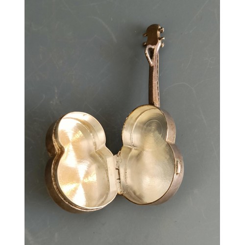 163 - A micro-mosaic brooch, in the form of a banjo, a plated vesta, in the form of a cello and three othe... 