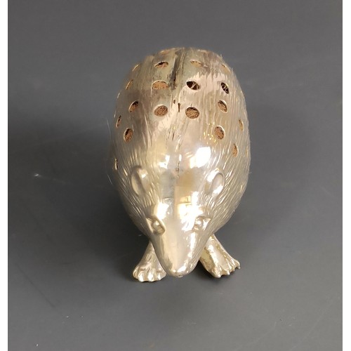 175 - A silver pin stand, in the form of a hedgehog, Birmingham 1904, 3 cm high