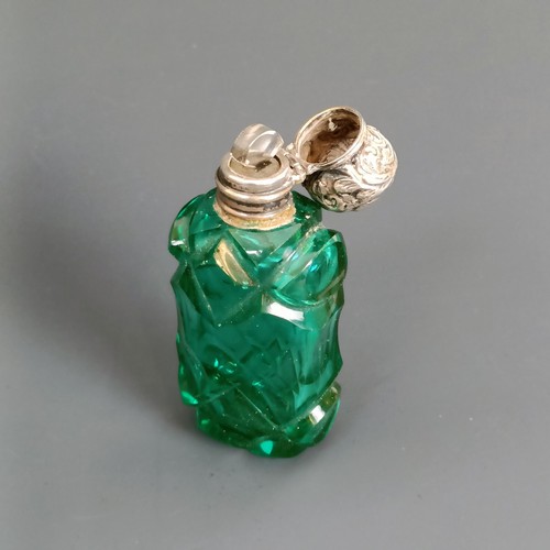 181 - A group of four glass and mounted scent bottles (4)