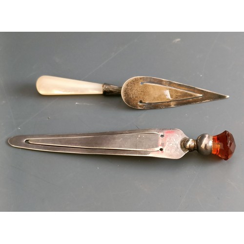 182 - A silver and mother of pearl book mark, in the form of a trowel, and another similar, Charles Horner... 