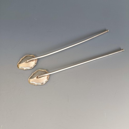 193 - A pair of Continental silver coloured metal cocktail stirrers, 18.5 cm (2)